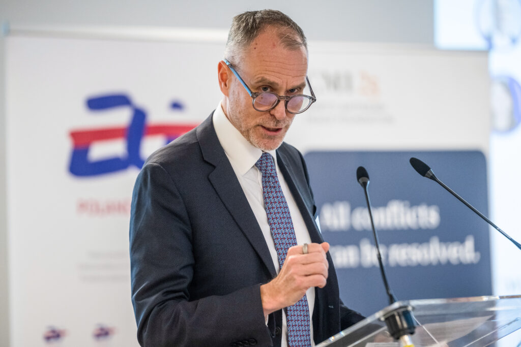 CEO of CMI talking to the crowd