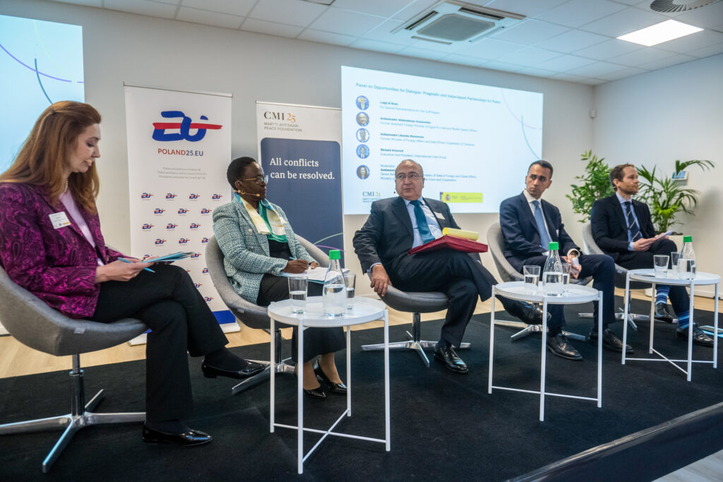 Panelists sitting and talking