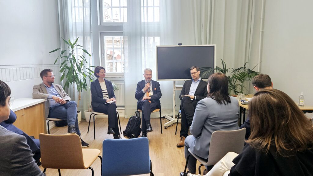 Pekka Haavisto speaking in front of people