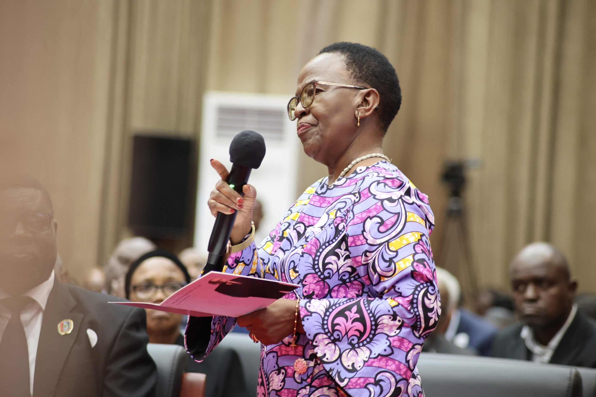 Audience member asks a question