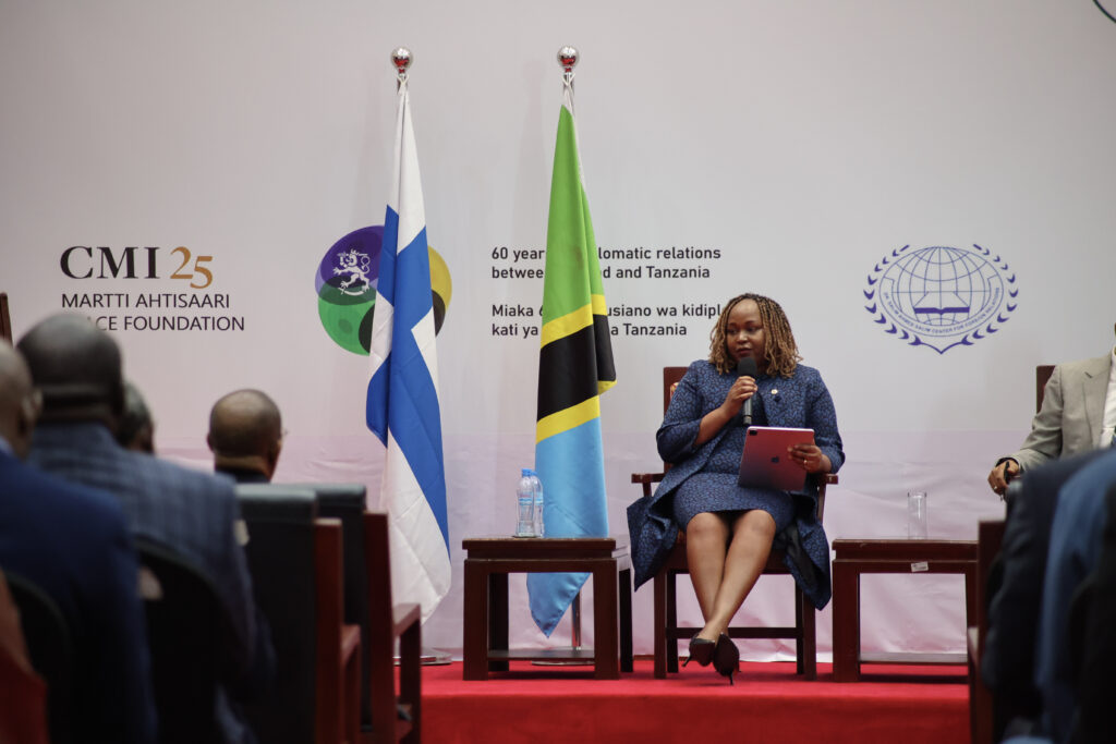 Panel member on stage