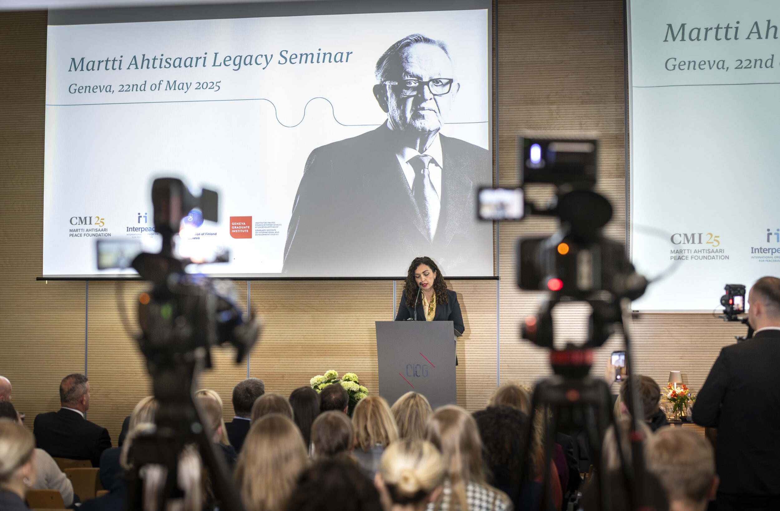 President of Kosovo on the podium speaking.