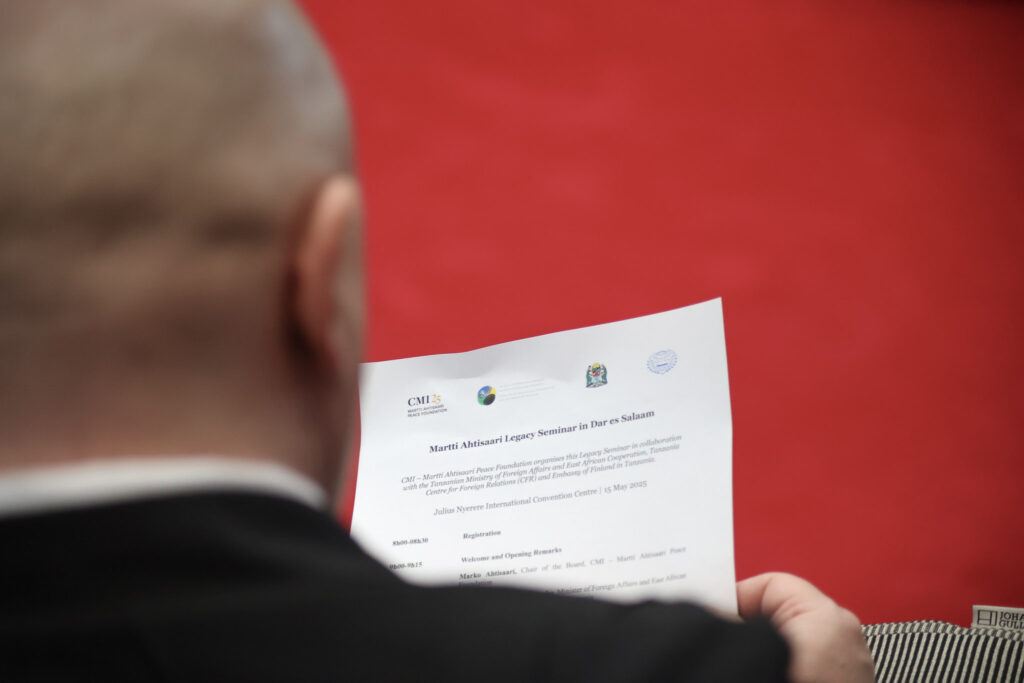 Man holding programme