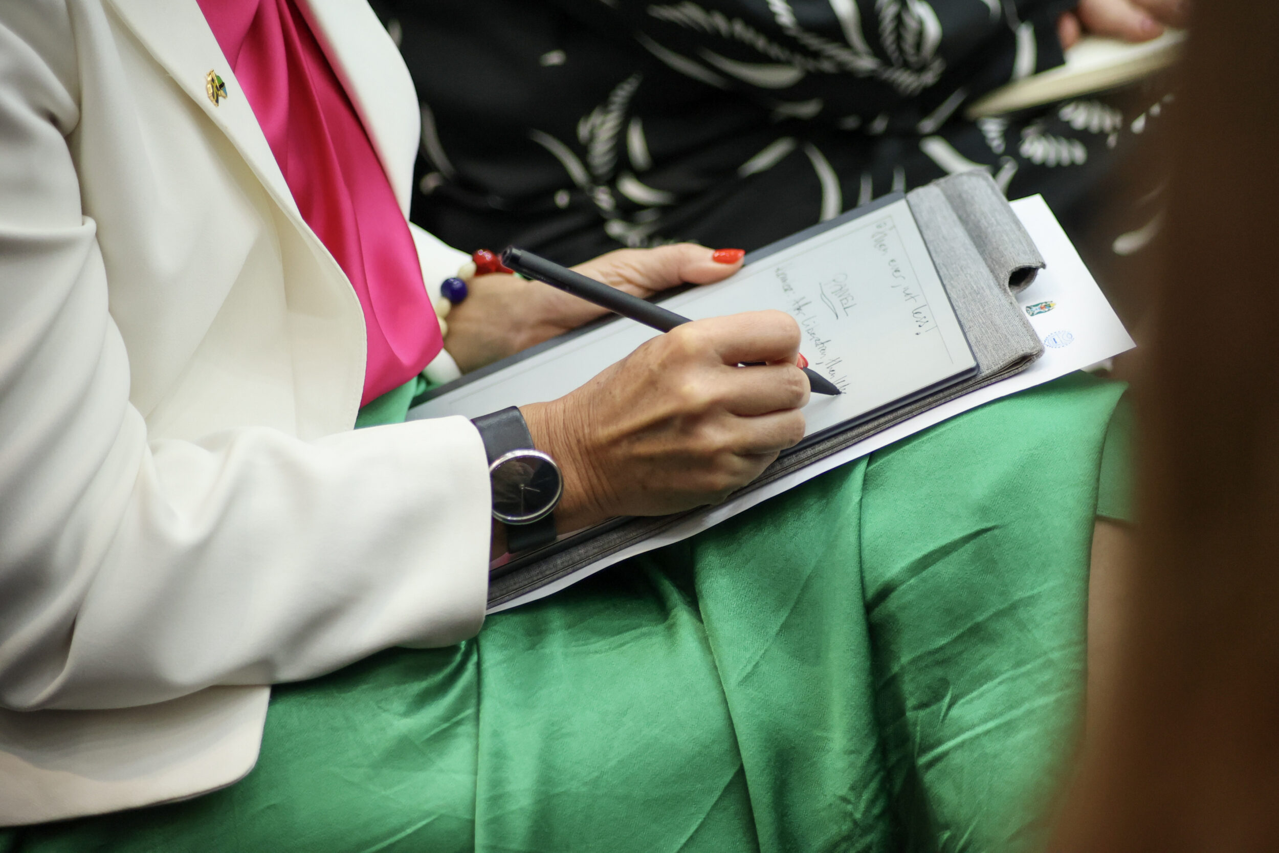 A person taking notes