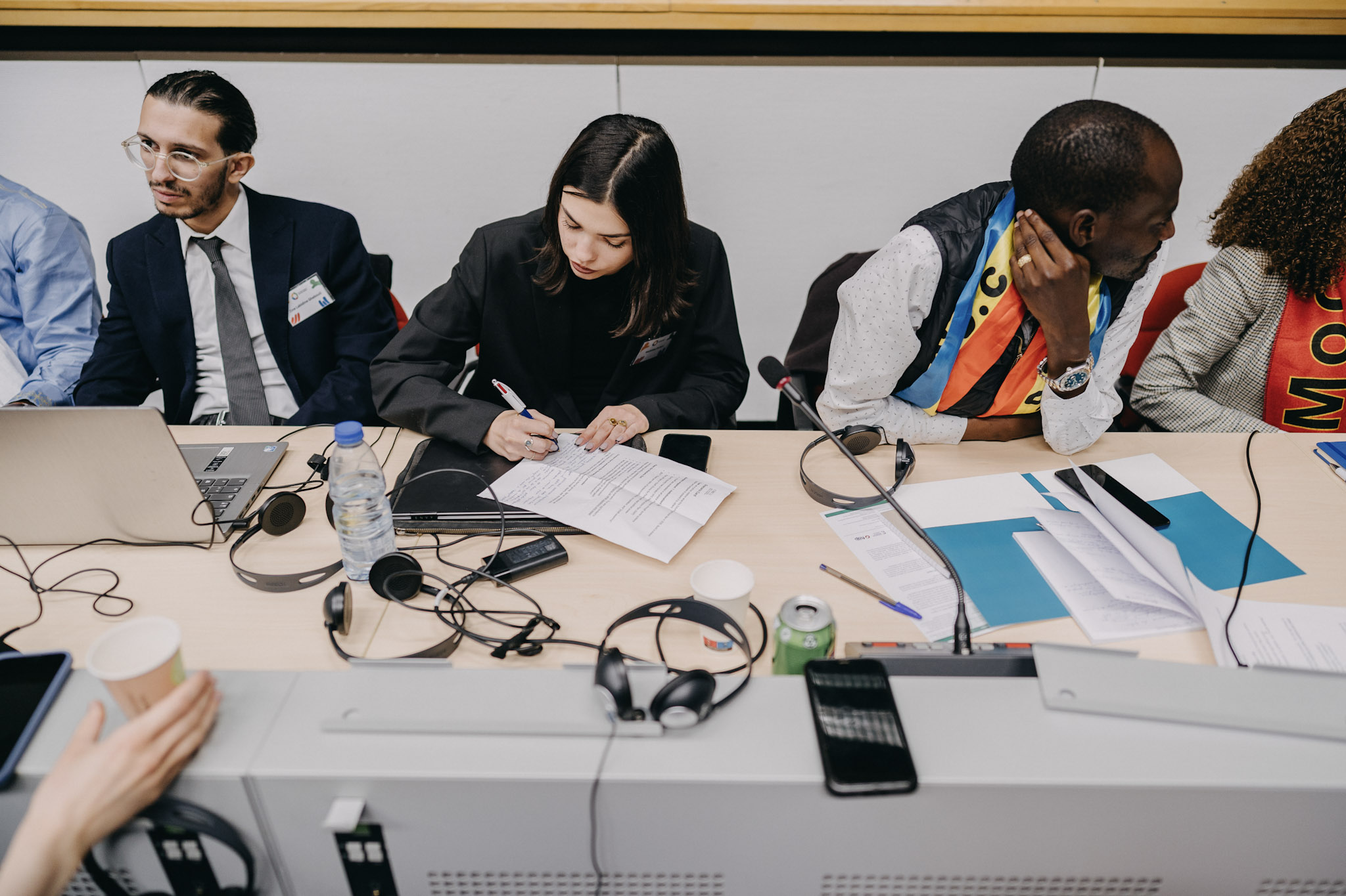 Participants seated at table.